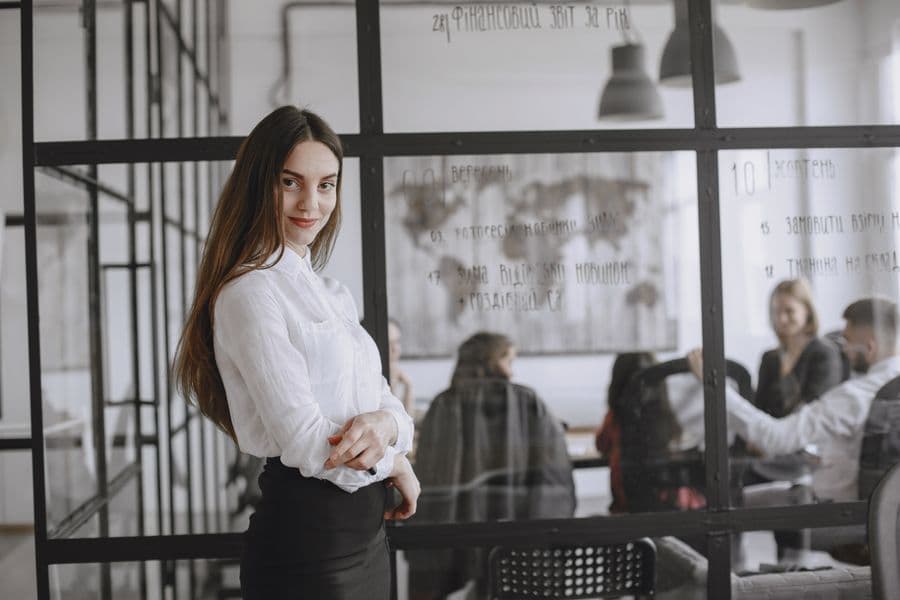 Professional in an office with colleagues